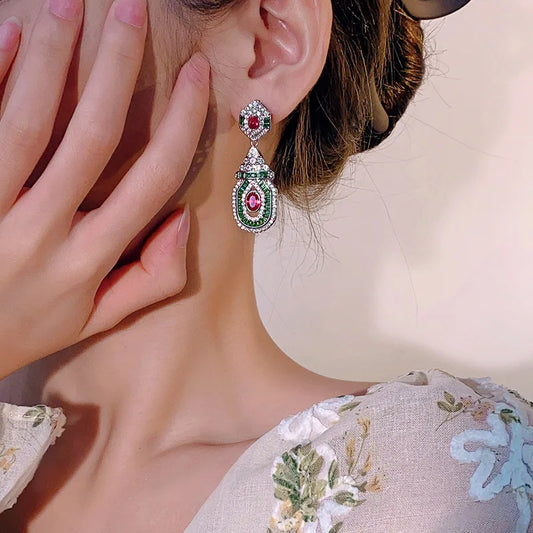 Luxury 18K Solid Platinum certified new true red corundum earrings.