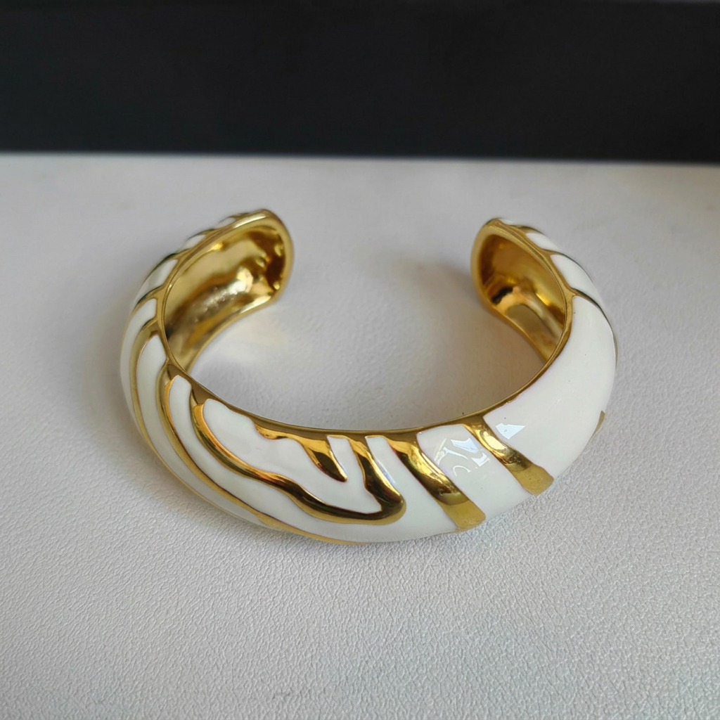White bracelet with background name removed