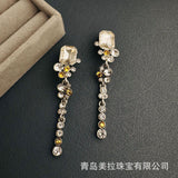 Oscar De La Renta European and American Retro Old Long Exaggerated Shoulder Sweep Ear Clip Elegant Niche Design