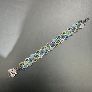 Green bracelet on black background