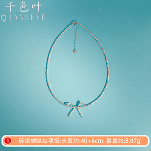 Broken Silver Bow Necklace