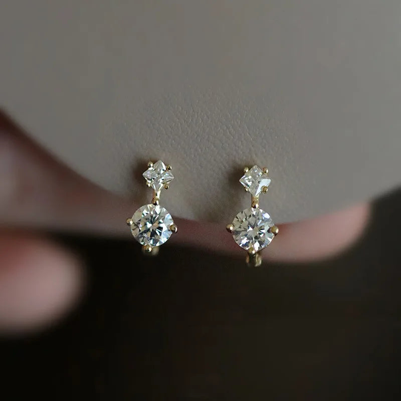 Classic Large and small diamond unique design earrings.