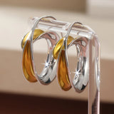 Simple Fashion Two Tone Metal Geometric Glossy Surface Hoop Earrings.