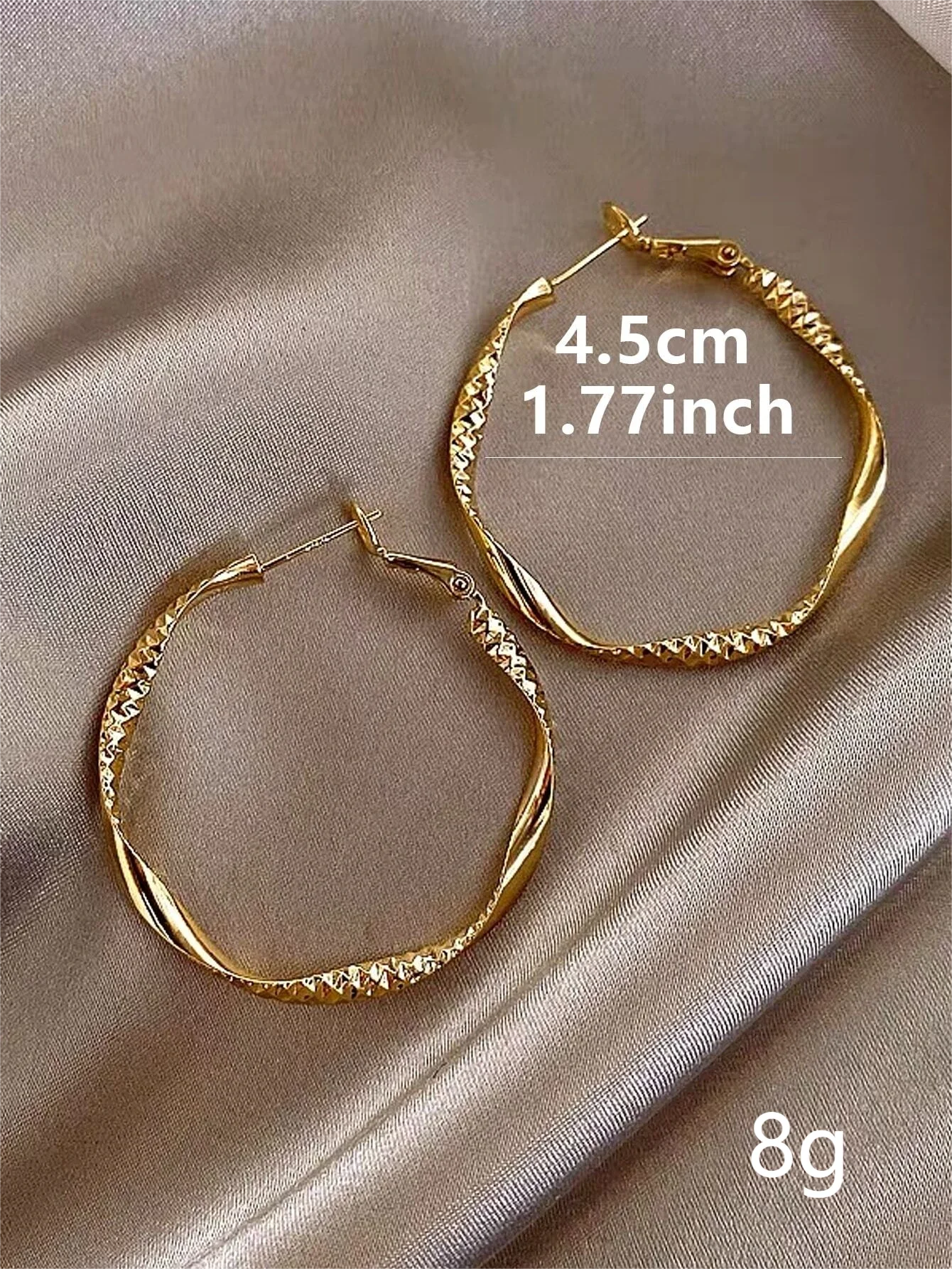 Exquisite silky texture design earrings elegant shape.