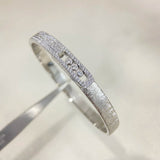 Classic circular bracelet, set with diamonds, luxurious and elegant