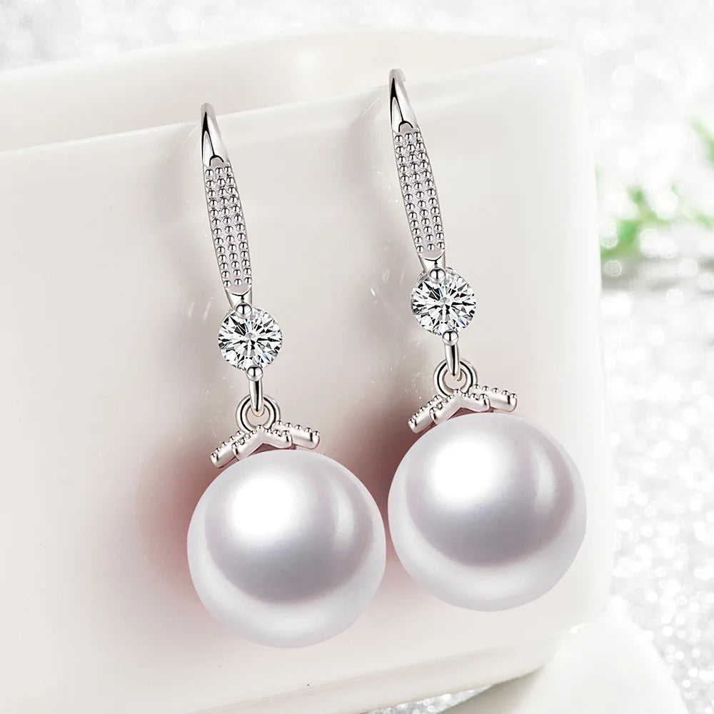 Silver Simple Luxury Pearl and Zirconia Earrings.