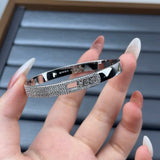Classic circular bracelet, set with diamonds, luxurious and elegant