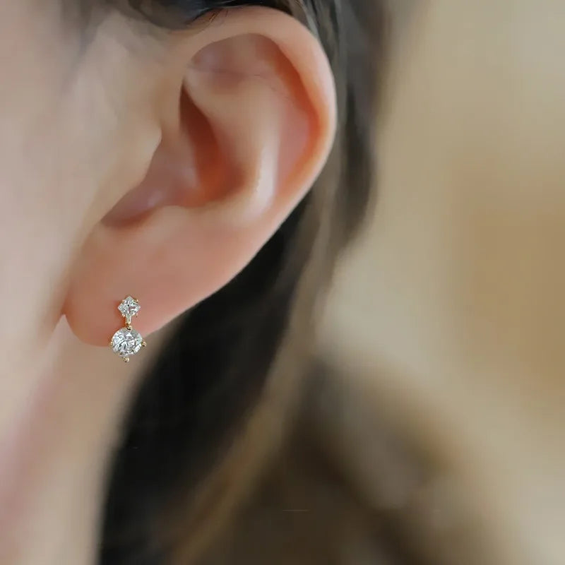 Classic Large and small diamond unique design earrings.