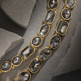 Grey gemstone necklace with text removed