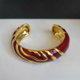 Red bracelet with background name removed